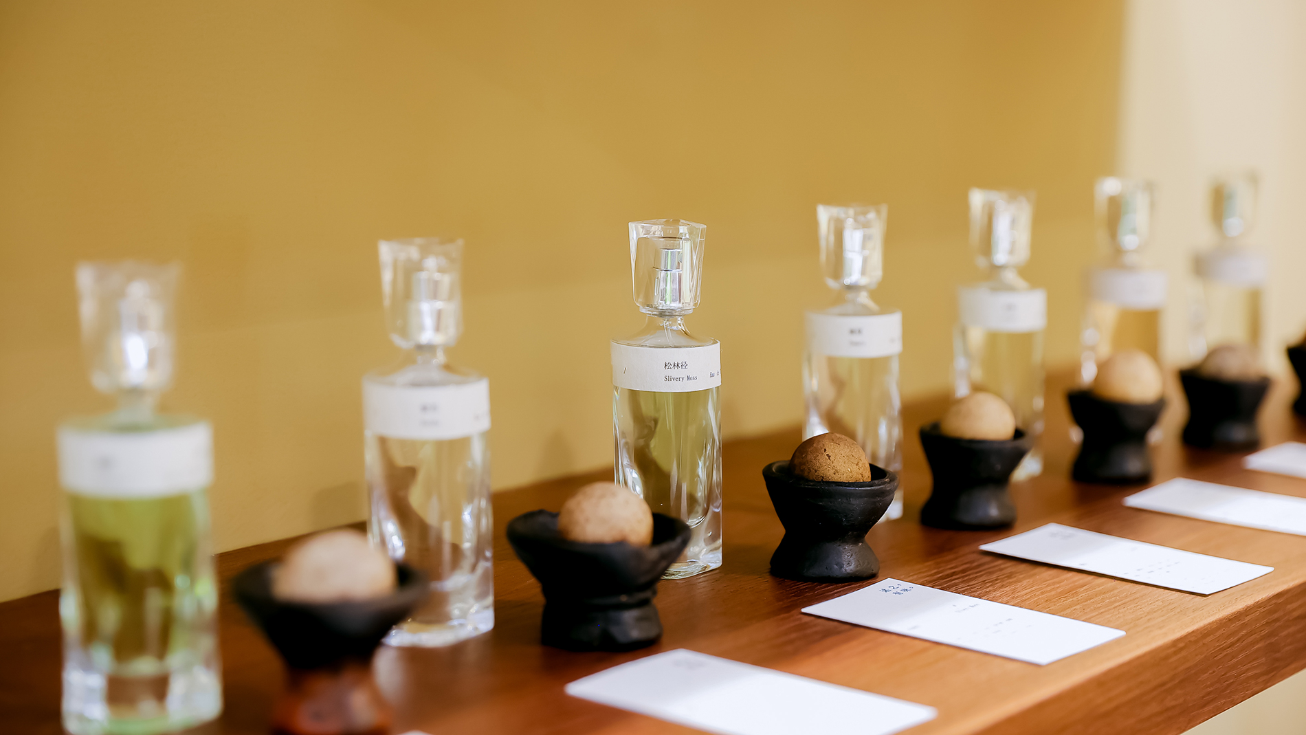 Notes Dubai - Perfume bottles on display